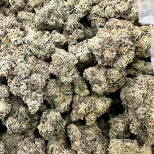 Gas Face loud flower macro displaying fire-level frosted trichome density across dense packed buds
